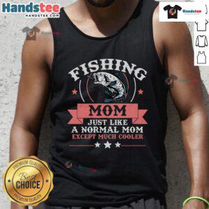 Nice mother angler in a tank top enjoying fishing on a sunny day, showcasing her passion for outdoor adventures.