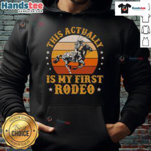 Alt Text: Vintage retro sunset hoodie featuring Nice My First Rodeo design with cowboy graphics, perfect for rodeo enthusiasts.