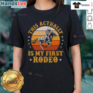 Vintage retro sunset cowboy ladies tee featuring 'My First Rodeo' design, perfect for rodeo fans and casual wear.