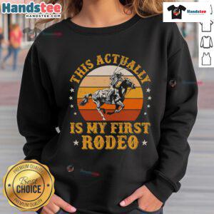 Alt Text: Vintage retro sunset cowboy sweatshirt featuring My First Rodeo design in a warm color palette.