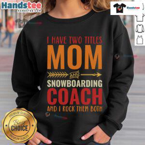 Nice retro sweatshirt featuring 'Mom and Snowboarding Coach' titles, perfect for proud moms and sporty enthusiasts.