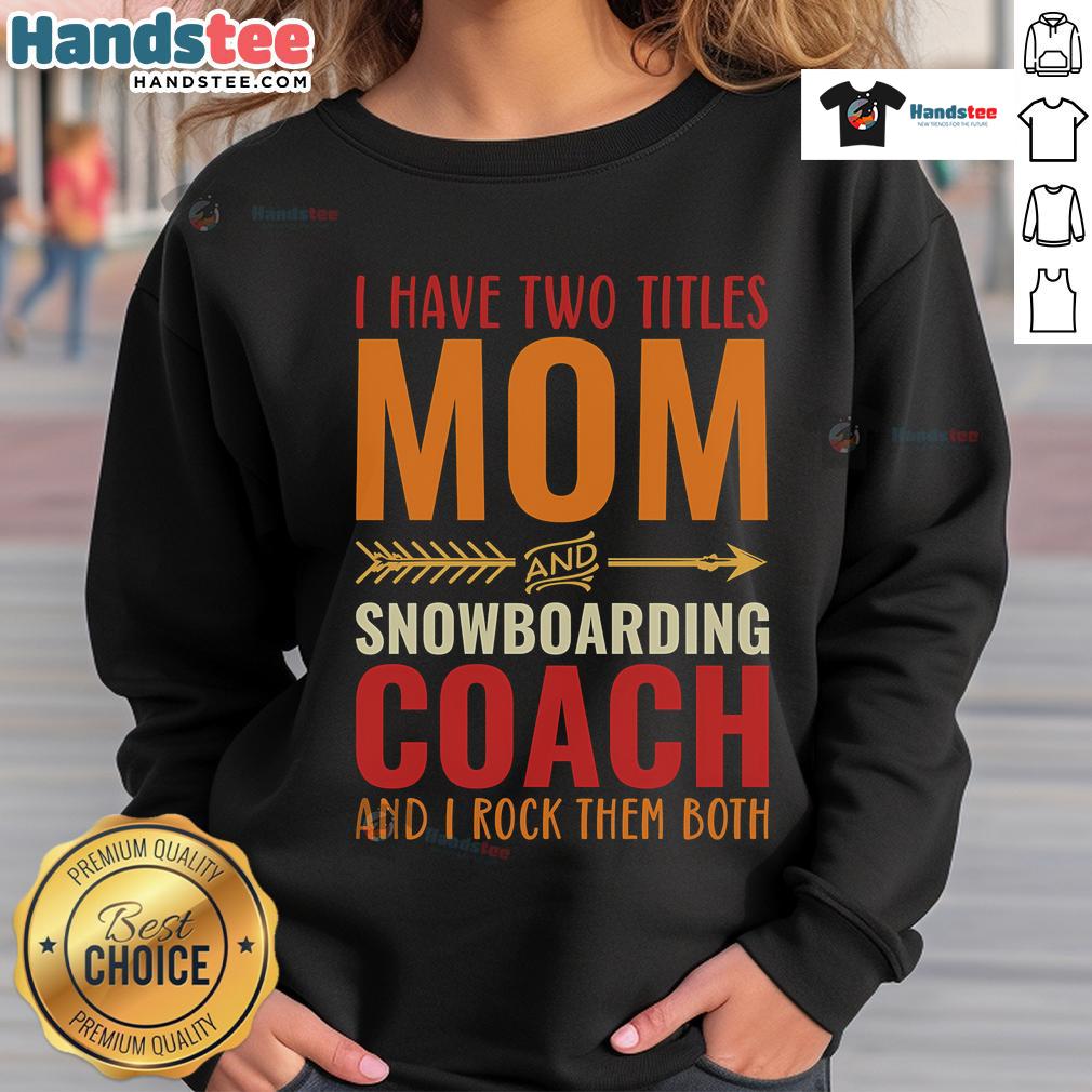 Nice retro sweatshirt featuring 'Mom and Snowboarding Coach' titles, perfect for proud moms and sporty enthusiasts.