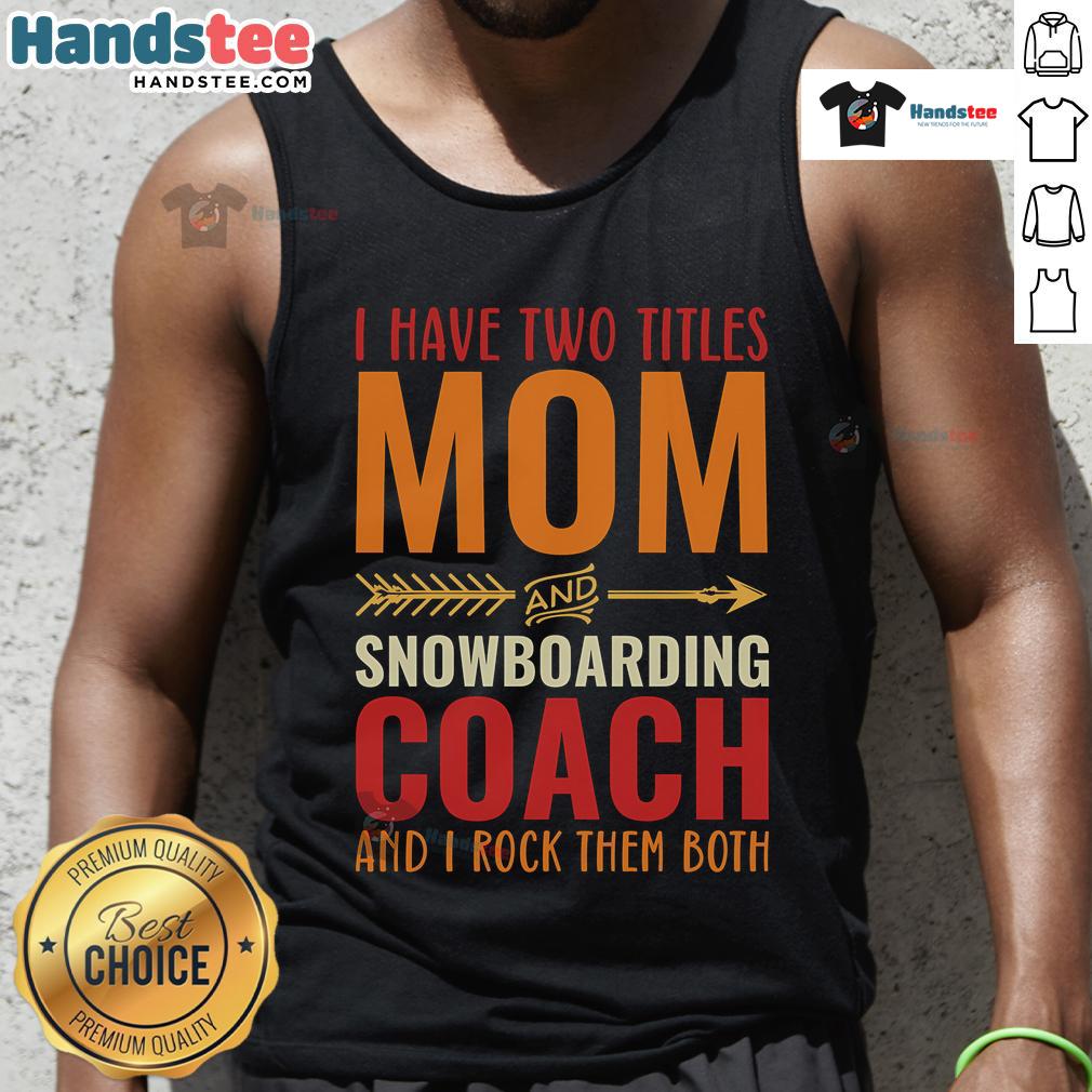 Woman wearing a tank top with 'Mom And Snowboarding Coach' graphic, showcasing her dual roles and passion for snowboarding.