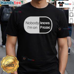 Robbie Williams 'Nobody Knows I'm On Prozac' T-Shirt featuring a vibrant design celebrating mental health awareness.