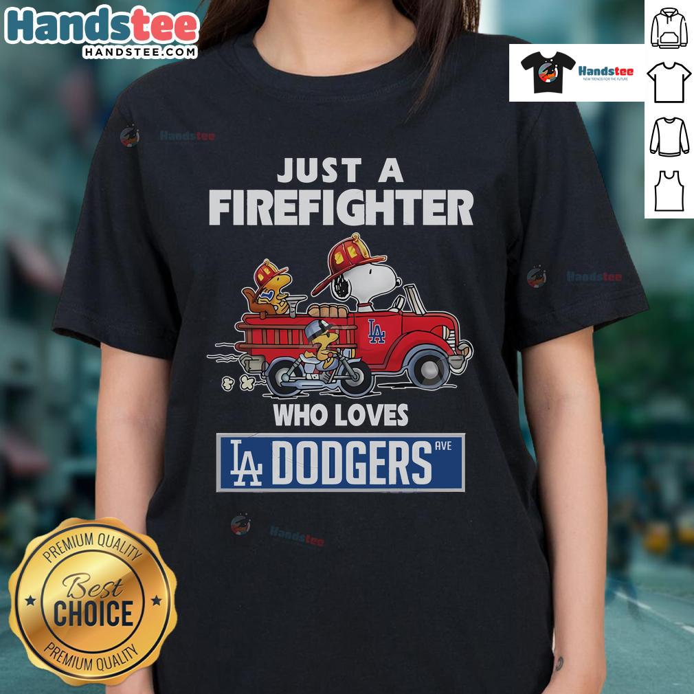 Nice Snoopy and Woodstock graphic on a firefighter tee celebrating Los Angeles Dodgers MLB, ideal for fans.