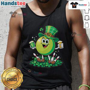 Beer lover in a St. Patrick's Day tank top enjoying bowling with friends, celebrating the holiday in style.