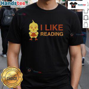 Cute chicken reading a book on a T-shirt, perfect for book lovers and chicken enthusiasts.