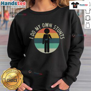 Funny 'I Do My Own Stunts' Get Well sweatshirt featuring a humorous design for injury recovery and arm support.