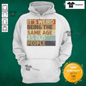 Funny retro sarcastic hoodie featuring 'It's weird being the same age as old people' design for humor lovers.
