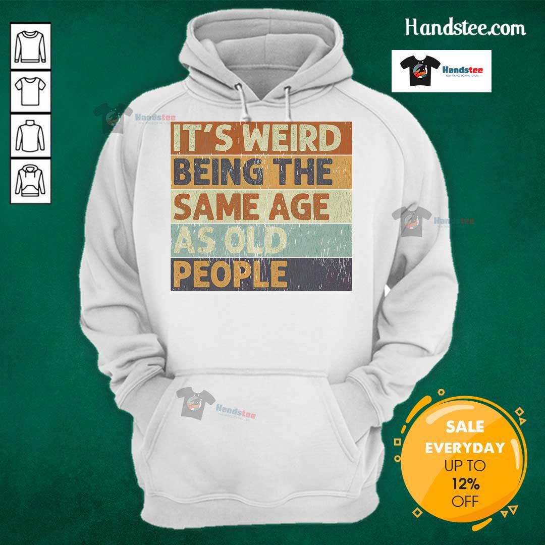 Funny retro sarcastic hoodie featuring 'It's weird being the same age as old people' design for humor lovers.