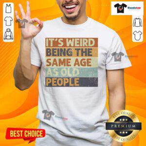 Funny retro sarcastic T-shirt design: 'It's Weird Being The Same Age As Old People' for humor lovers.