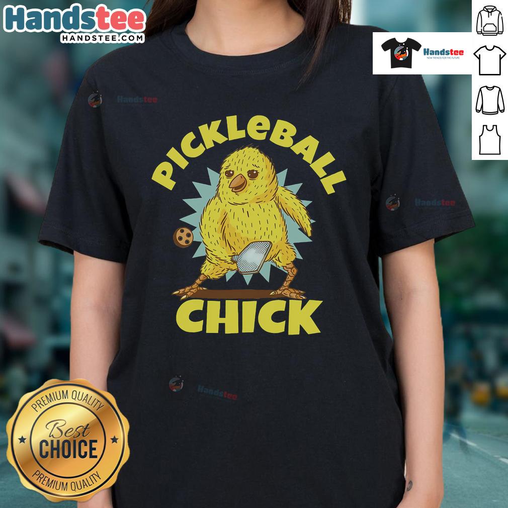 Funny pickleball chick player in a ladies tee, showcasing her love for pickleball on the court with a playful smile.