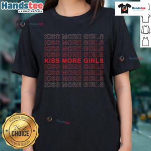 Funny Saying 'Kiss More Girls' on a stylish ladies tee, perfect for casual outings and expressing humor.