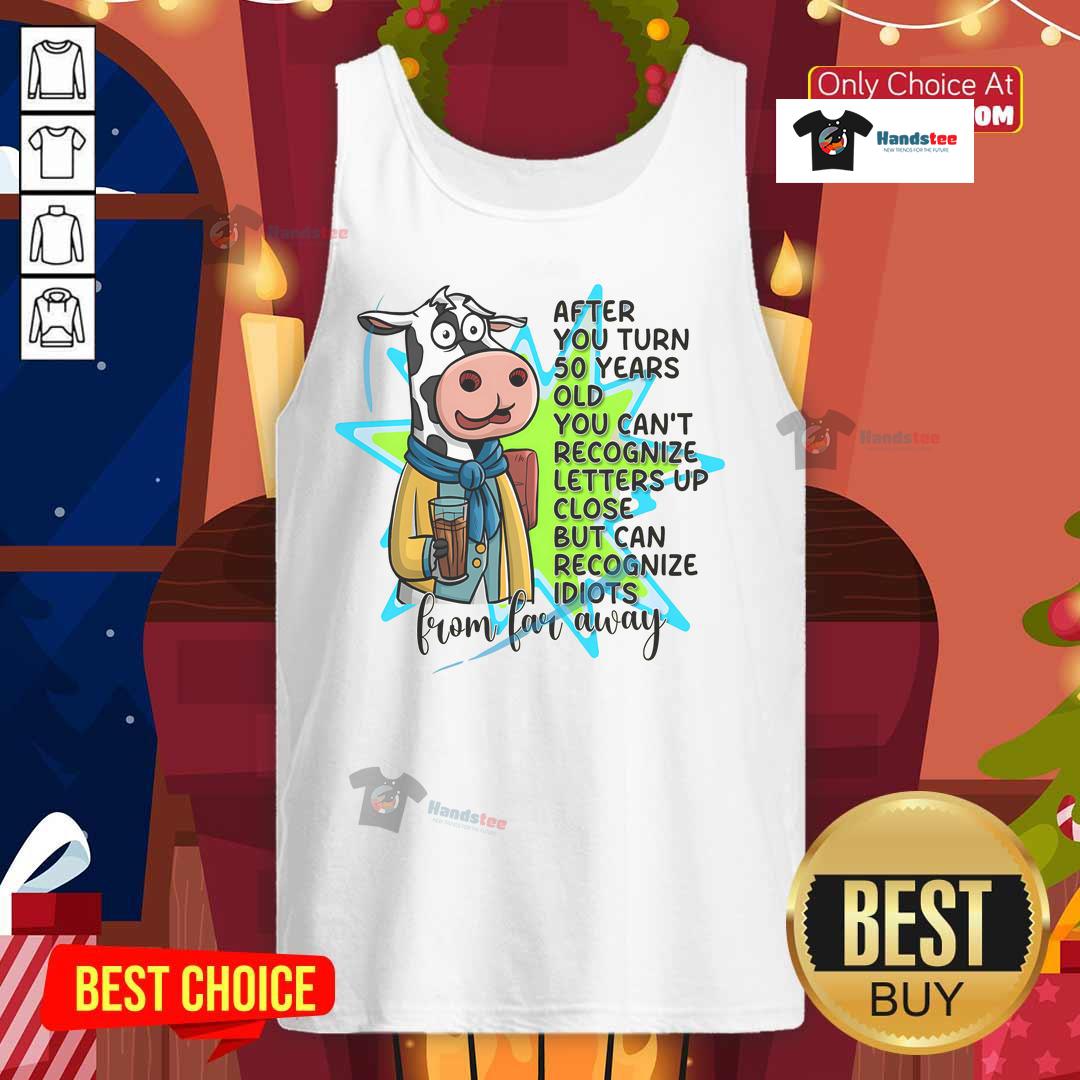 A person wearing a tank top struggles to recognize letters up close after turning 50, highlighting age-related vision changes.