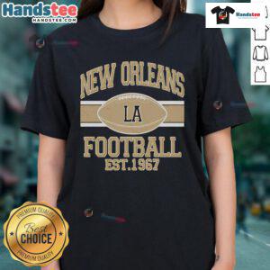 Vintage New Orleans LA football logo on a ladies tee, perfect for sports fans and vintage apparel lovers.