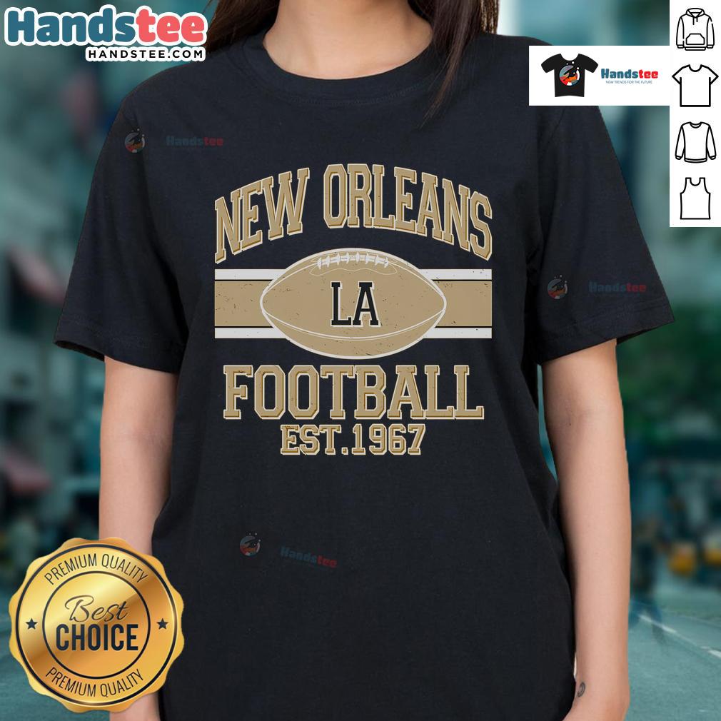 Vintage New Orleans LA football logo on a ladies tee, perfect for sports fans and vintage apparel lovers.