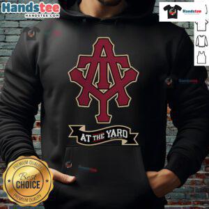 Stylish Nice At The Yard Initials and Banner Hoodie featuring a modern design in casual outdoor setting.