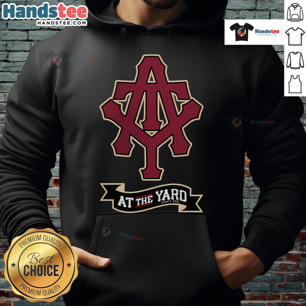 Stylish Nice At The Yard Initials and Banner Hoodie featuring a modern design in casual outdoor setting.