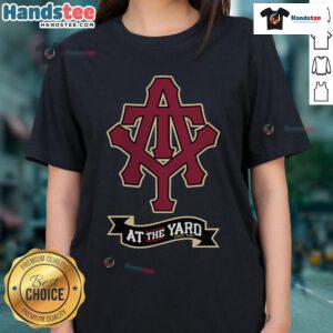 Nice At The Yard Ladies Tee featuring initials and a stylish banner design for a trendy look.