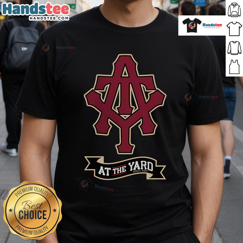 Alt Text: Nice At The Yard Initials and Banner T-Shirt featuring stylish design in vibrant colors for casual wear.
