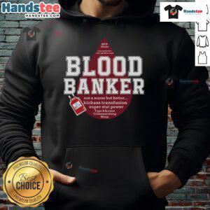 Lab scientist wearing a Nice Blood Bank hoodie in a medical lab during Lab Week, showcasing lab technology.