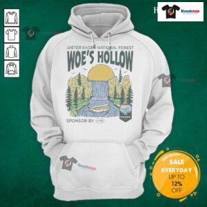 Alt Text: Hiker wearing a Nice Dieter hoodie in Eagen National Forest, showcasing wildlife and scenic trails in Woes Hollow.