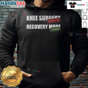 Post knee surgery recovery: patient wearing a hoodie celebrating successful knee replacement surgery.