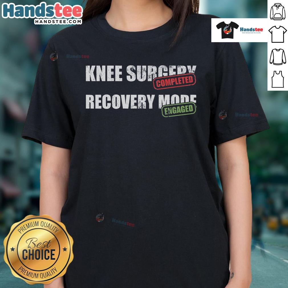 Recovering from knee replacement surgery, a woman relaxes in a comfy tee celebrating her Nice Knee Surgery journey.