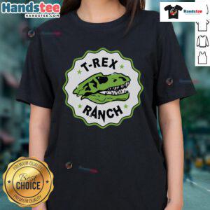 Nice T-Rex Ranch ladies tee featuring a vibrant dinosaur graphic and stylish design, perfect for casual wear.