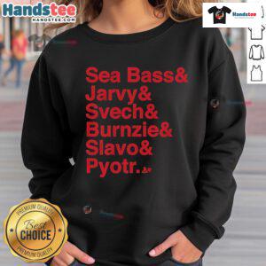 Alt Text: Official Carolina Hockey sweatshirt featuring Ampersand design with Sea Bass, Jarvy, Svech, Burnzie, Slavo, Pyotr graphics.