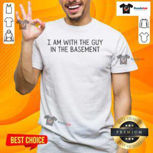 Alt Text: Official I Am With The Guy In The Basement T-Shirt featuring a unique design and bold graphics for fans.