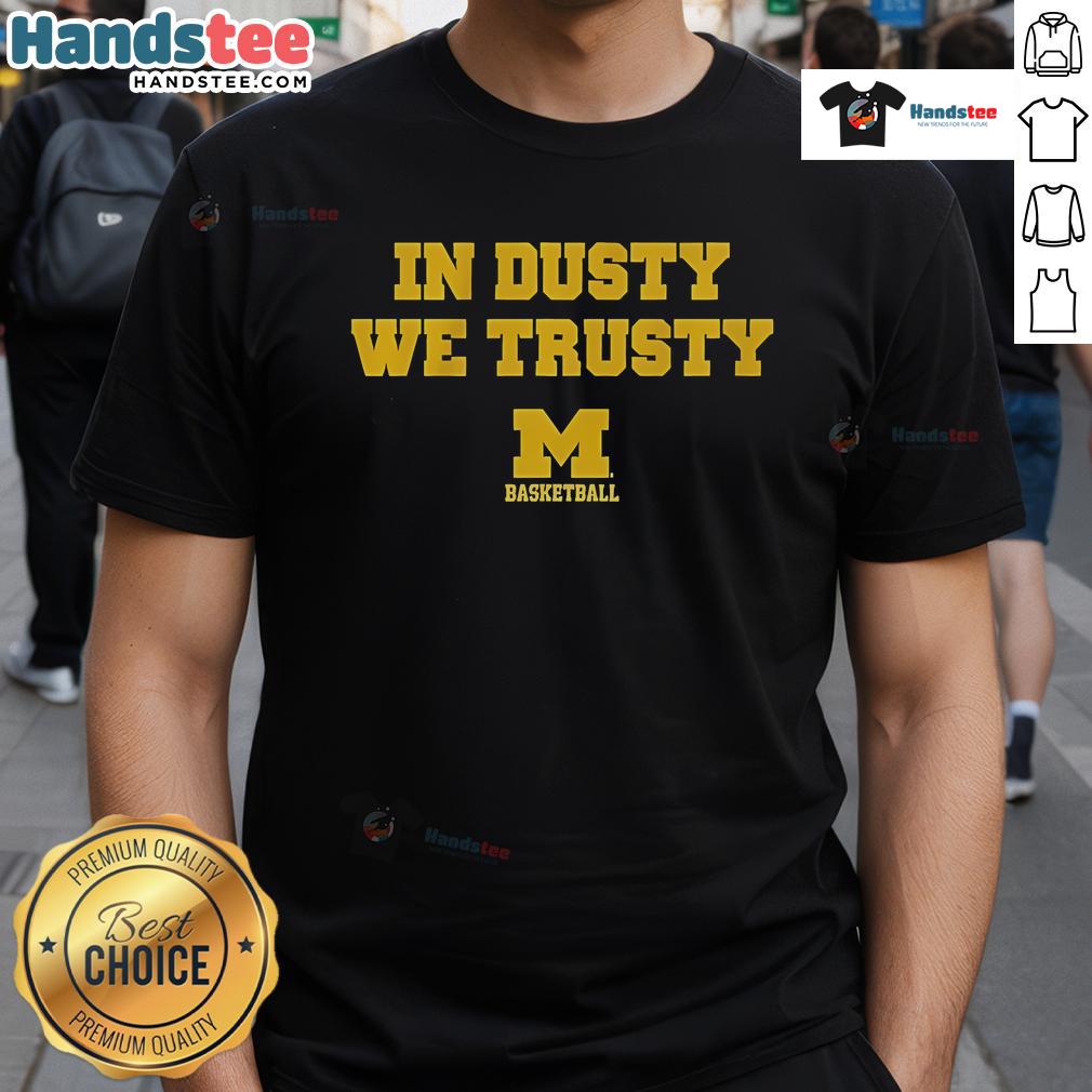 Official Michigan Basketball 'In Dusty We Trusty' T-Shirt featuring bold graphics and team colors, perfect for fans.