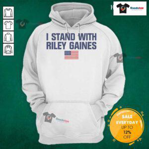 Alt Text: Top I Stand With Riley Gaines hoodie featuring American flag design, supporting female swimmer's rights.