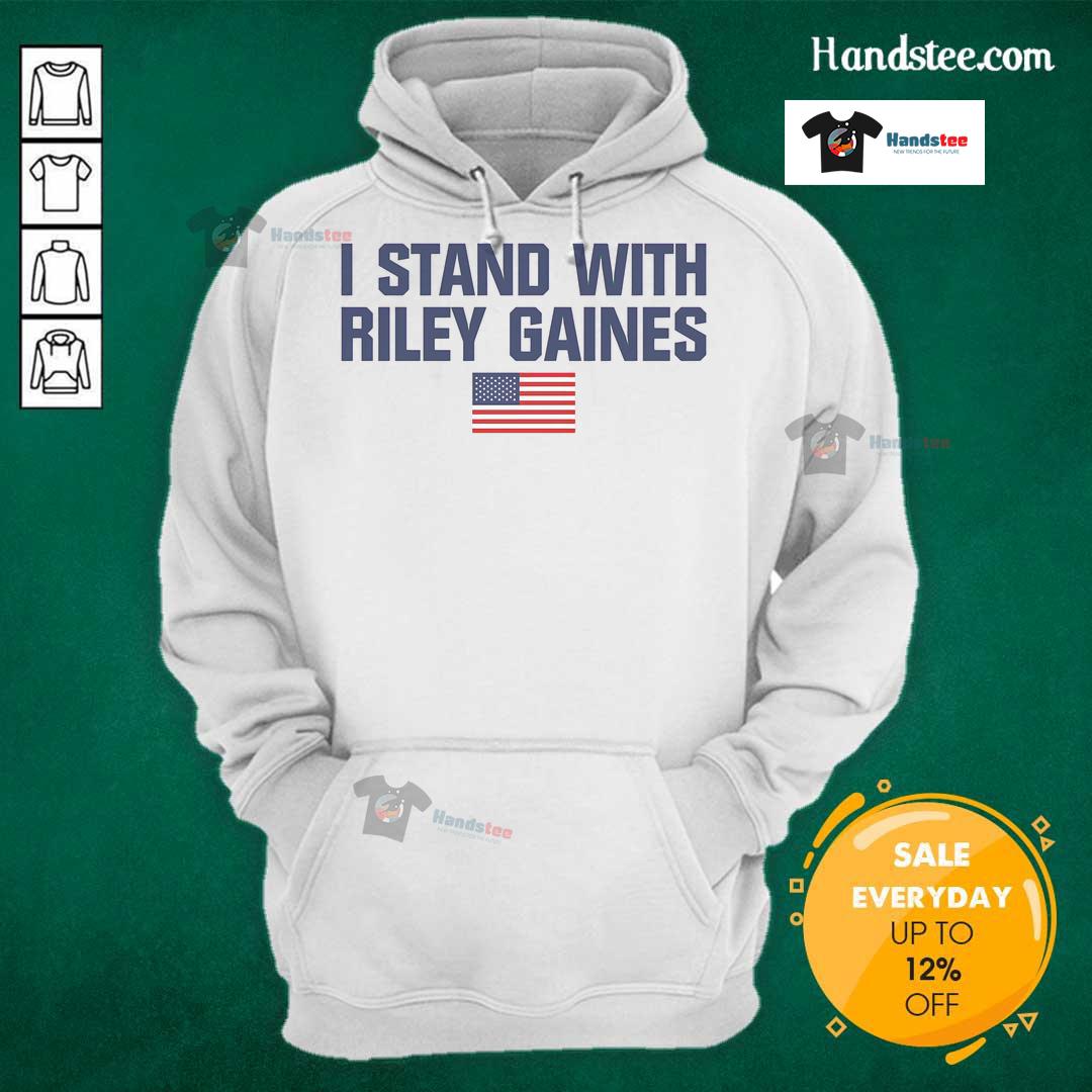 Alt Text: Top I Stand With Riley Gaines hoodie featuring American flag design, supporting female swimmer's rights.