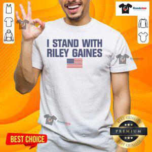 Top I Stand With Riley Gaines American Flag Swimmer T-Shirt featuring patriotic design and swimmer graphics.