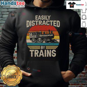 Funny hoodie for train lovers featuring a distracted by trains graphic against a sunset background.