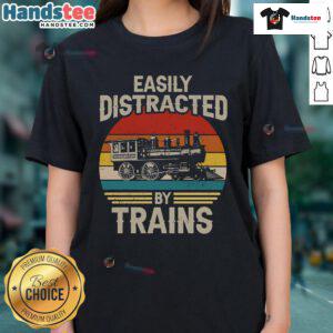 Funny train lover tee featuring a distracted by trains design against a sunset backdrop, perfect for railroad enthusiasts.