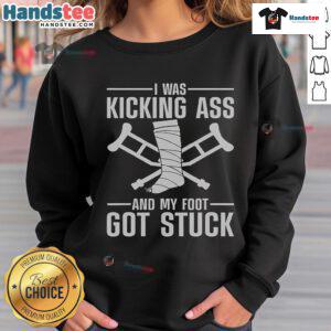 Funny sweatshirt featuring the phrase 'I Was Kicking Ass' with a graphic about broken leg and knee surgery humor.