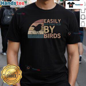 Funny retro vintage t-shirt design for bird lovers, featuring a humorous 'Easily Distracted By Birds' slogan.