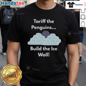 Funny Tariff The Penguins Build The Ice Wall T-Shirt featuring cartoon penguins in a humorous ice wall scene.