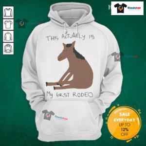 Funny 'This Actually Is My First Rodeo' horse hoodie design featuring a playful rodeo theme and vibrant colors.