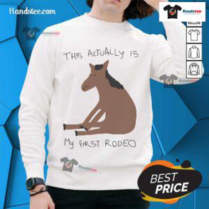 Funny 'This Actually Is My First Rodeo' horse sweatshirt, perfect for rodeo lovers and casual wear enthusiasts.
