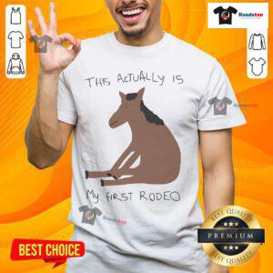 Funny 'This Actually Is My First Rodeo' horse t-shirt design featuring a playful cowboy theme and vibrant graphics.