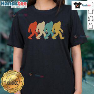 Retro pop art silhouette of Bigfoot on a ladies tee, showcasing a stylish Sasquatch design for fans of cryptids.