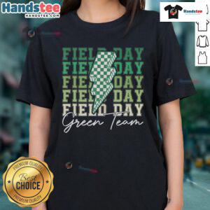 Good Field Day Green Team ladies participating in a fun field trip game, showcasing team spirit in vibrant green tees.