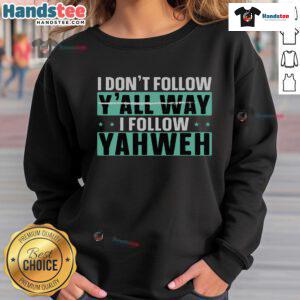 Christian believer sweatshirt with 'Good, I Don't Follow Y'all, I Follow Yahweh' graphic design for faith-inspired fashion.