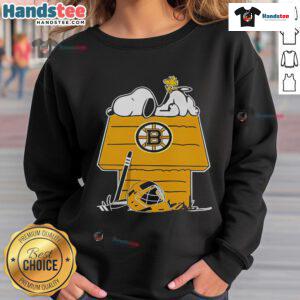 Good Snoopy and Woodstock on the chimney design featured on a Boston Bruins hockey sweatshirt.