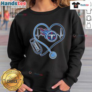 Good Tennessee Titans Caring Hearts Nurses Sweatshirt featuring team logo, perfect for Titans fans and healthcare heroes.