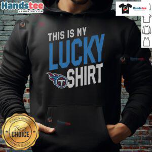 Woman wearing a Tennessee Titans lucky hoodie, showcasing team spirit and style at a game day event.