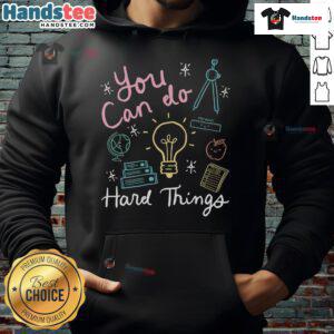 Teacher wearing 'Good Testing Day' hoodie, promoting positivity and resilience in education during testing season.